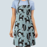 Black and White Tuxedo Cats Apron<br><div class="desc">Cute black and white tuxedo cats going about their business. A fun pattern on a mid blue background.</div>