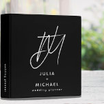 Black and White Wedding Planner Binder<br><div class="desc">Keep all your wedding plans organized with this sleek and modern black and white wedding planner binder. The unique brush script 2 initial monogram with the customizable name and spine text make this binder a truly personalized wedding planning tool. With plenty of space for budgets, guest lists, vendor information, and...</div>