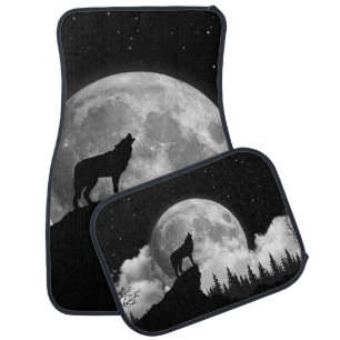 Black and white wolf howling at the moon car floor mat