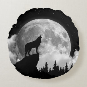 Black and white wolf howling at the moon round pillow