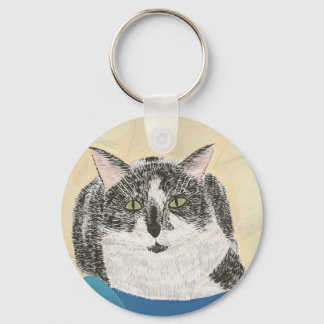 Black and WhiteTuxedo cat on blue blanket keychain