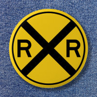 Black and Yellow Warning Sign Railroad Crossing