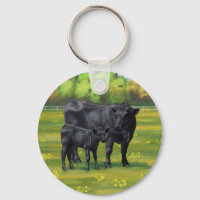 Black Angus Cow & Cute Calf in Summer Pasture