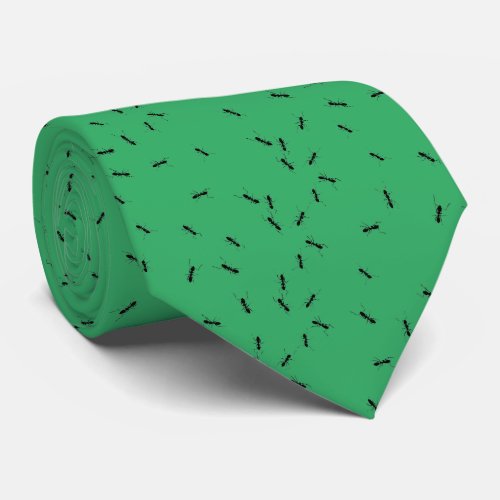 Black ants on grass green neck tie