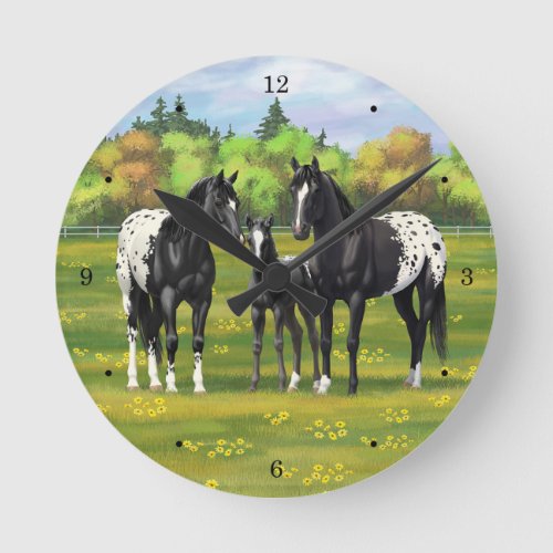 Black Appaloosa Horses In Summer Pasture Round Clock