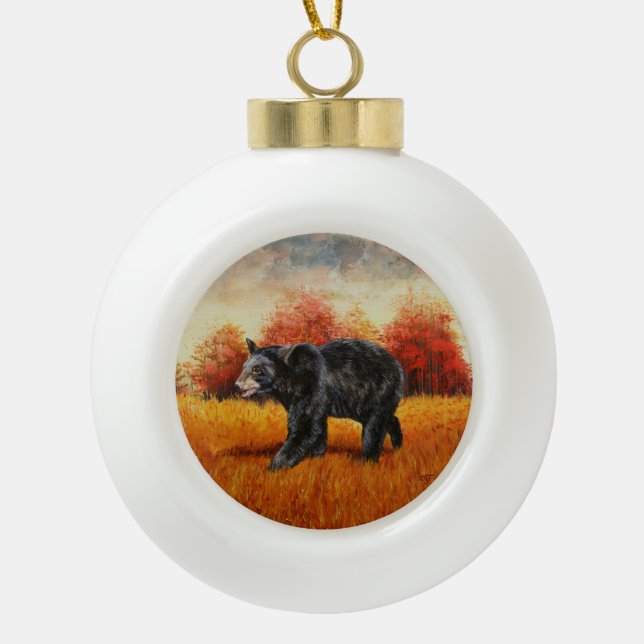 Black Bear in Autumn Forest Ceramic Ball Christmas Ornament (Front)