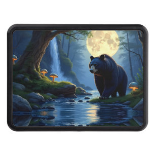Black bear in forest at night hitch cover