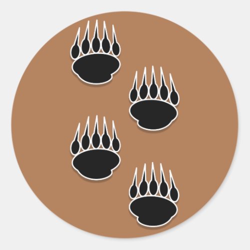 Black Bear Paw Prints On Earth Tone Background Classic Round Sticker