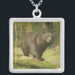 Black Bear Stepping on a Tree Trunk Silver Plated Necklace<br><div class="desc">This fine art print by Oliver Kemp illustrates a brown bear stepping on a fallen tree in a forest. The pastel green colors are calming for the eye and create a nice warm feeling of the awakening nature in the spring. A great addition to any rustic home decor!</div>