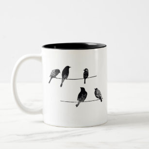 https://rlv.zcache.com/black_birds_on_wire_worn_look_two_tone_coffee_mug-r5628fd828e7b488cb3e0a404fda8beff_x7j1m_8byvr_307.jpg