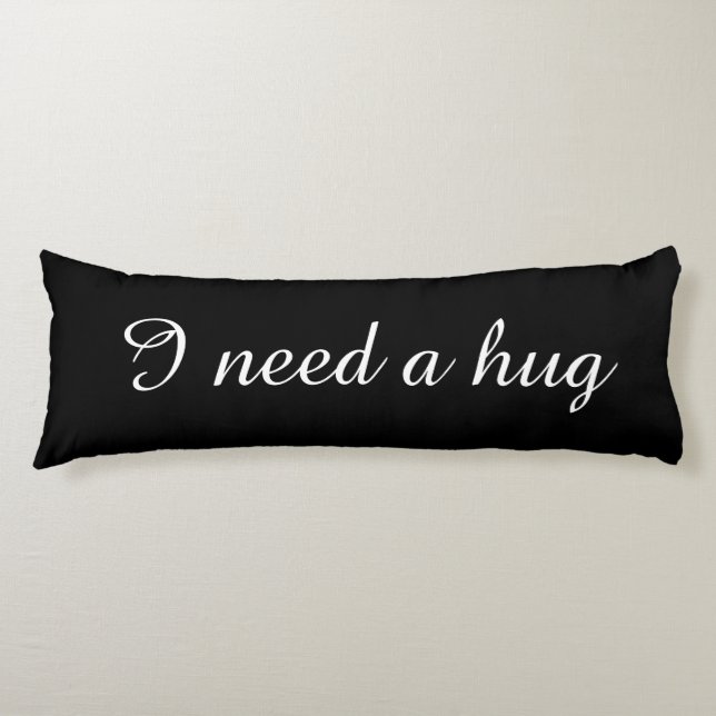 Black body pillow with custom text | I need a hug (Front)