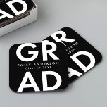 Black | Bold Grad Graduation Party Square Paper Coaster<br><div class="desc">Custom graduation paper coasters featuring "Grad" in bold white lettering with a black background. Personalize the graduation coasters by adding the graduate's name and graduation year. The personalized graduation coasters are perfect for both high school and college graduation parties.</div>