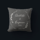 Black Botanical Personalized Script Wedding Names Throw Pillow<br><div class="desc">This elegant throw pillow features a sophisticated charcoal background with a delicate white floral wreath, beautifully showcasing the names and date of a special couple. Perfect for commemorating weddings, anniversaries, or engagements, it brings a timeless charm to any home decor. A thoughtful and personalized keepsake for modern couples who appreciate...</div>