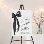 Black Bow Coquette Sweet 16 Birthday Welcome Foam Board<br><div class="desc">Welcome your guests in style with this Black Bow Coquette Sweet 16 Birthday Welcome Poster! 🎀✨ Featuring an elegant black bow and chic coquette-inspired design, this sign adds a sophisticated yet playful touch to your celebration. Perfect for setting the tone for an unforgettable Sweet 16 party! 💕 Personalize it with...</div>