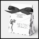 Black Bow She's Tying The Knot Bridal Shower Favor Boxes<br><div class="desc">A stylish and sentimental finishing touch, these Black Bow She's Tying The Knot favor boxes make a thoughtful statement at your bridal shower. Designed with a timeless watercolor bow pattern, they exude sophistication while offering a charming way to thank your guests. Ideal for housing delicate treats, macarons, small gifts, or...</div>
