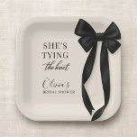 Black Bow She's Tying The Knot Party Paper Plates<br><div class="desc">Party paper plates designed with a classic black bow motif and the phrase shes tying the knot. Created for a clean, elegant table setting that pairs well with black and white wedding decor. Suitable for bridal showers, engagement parties, bachelorette gatherings, and wedding celebrations. Fully customizable text with a print-ready design...</div>