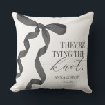 Black Bow Tying the Knot Bridal Shower Gift Throw Pillow<br><div class="desc">Elevate your bridal shower gift with this Coquette Black Bow Party Decor! This timeless design adds a touch of elegance and charm to any event, featuring a beautifully crafted bow adorned with delicate black hues. This collection is sure to impress your guests and create lasting memories and perfect for adding...</div>