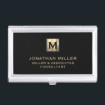 Black Brushed Gold Monogram Business Card Case<br><div class="desc">Elevate your professional look with this stylish and practical business card case. Featuring a brushed monogram medallion with your name company and title in classic block typography, this case is a great way to keep your business cards organized and protected. The sleek black background adds a touch of sophistication, while...</div>