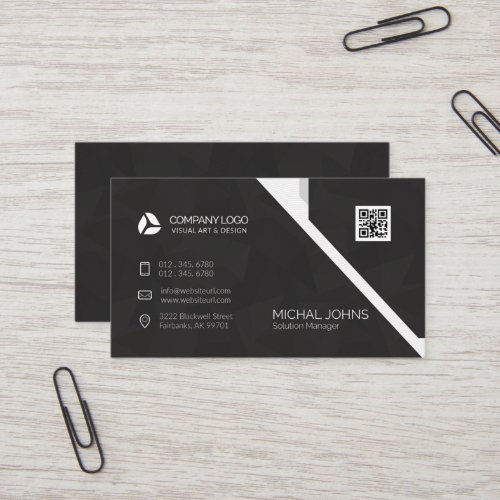 Black business card with silver details