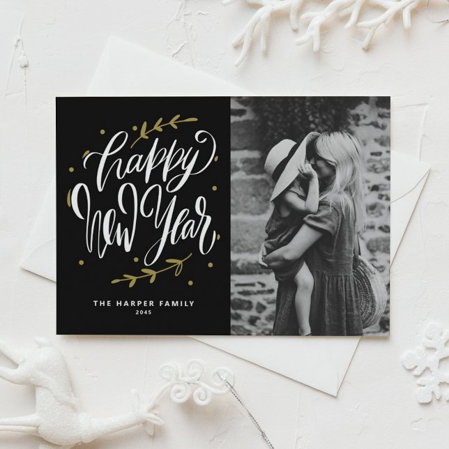 Black Calligraphy and Wreath New Year Photo Holiday Card (Customizable photo Happy New Year card featuring modern calligraphy and wreath.)