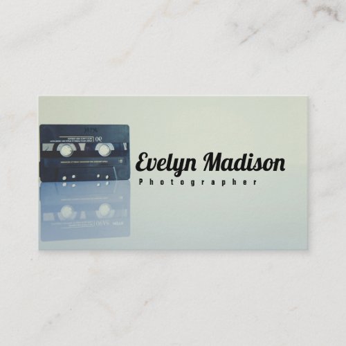 black cassette tape on white surface business card