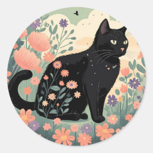 Black cat illustration in a field of flowers classic round sticker
