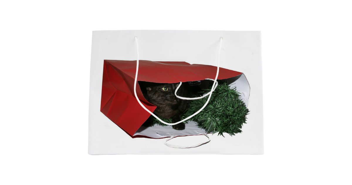 Black cat in a gift bag Christmas Zazzle