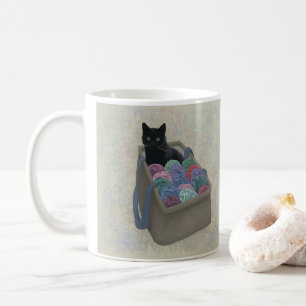 Black cat in yarn bag coffee mug