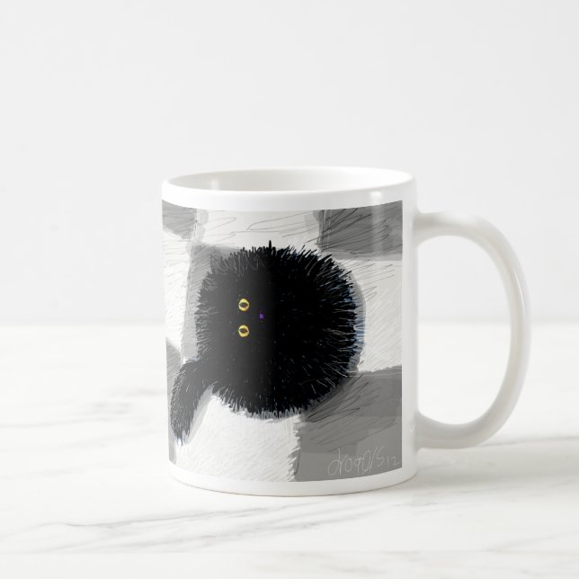 Black cat looking up coffee mug (Right)