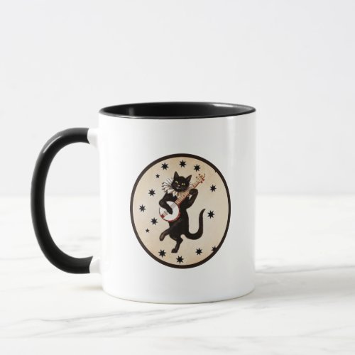 Black cat playing banjo mug