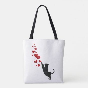 Black Cat Plays With Red Hearts Tote Bag by deemac2 at Zazzle