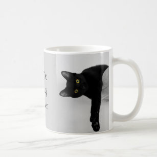 Black Cat relaxing on couch Coffee Mug