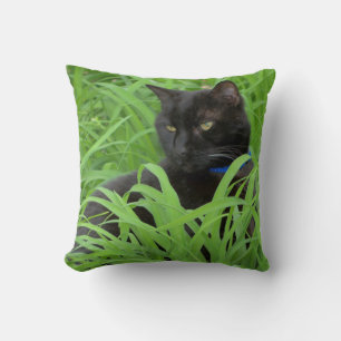 Black Cat Sitting in Lily Garden Throw Pillow