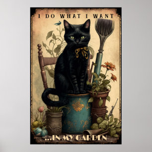 Black Cat sitting in the garden Poster