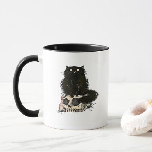 Black Cat Sitting On Skull Halloween Mug