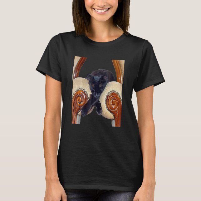Black Cat Slouched Between Wo Chairs Legs Crossed T-Shirt (Front)