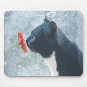 Black Cat Sniffing Flower Mouse Pad