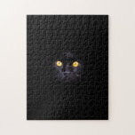 Black Cat Solid Background Difficult  Animal Pet Jigsaw Puzzle<br><div class="desc">A challenging puzzle for a cat or animal lover! A black cat with golden eyes peers through a hole in the solid black background. Just its eyes and fur highlights break the dark design. Difficult but fun for any puzzle fan! Purrr-fect for Halloween! Designed by Tuzi Williams.</div>