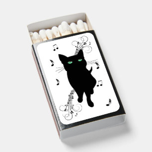 Black Cat Surrounded by Whispering Notes of Music Matchboxes