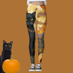 Black Cat Underneath a Harvest Moon and Pumpkins Leggings<br><div class="desc">Black kitty cat underneath a harvest moon and sitting in a field of pumpkins.</div>