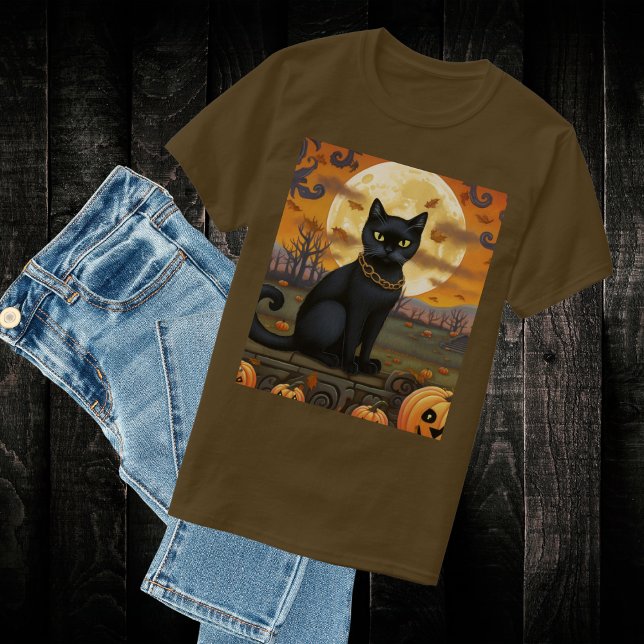 Black Cat Underneath a Harvest Moon and Pumpkins T-Shirt (Black Halloween kitty underneath a harvest moon T-Shirt.  For a ghoulish night out on Halloween.)