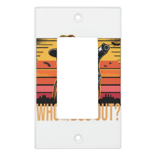 Black cat wearing orange suit who let the dogs out light switch cover