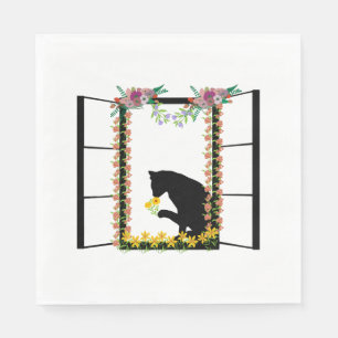 black cat with flower napkins