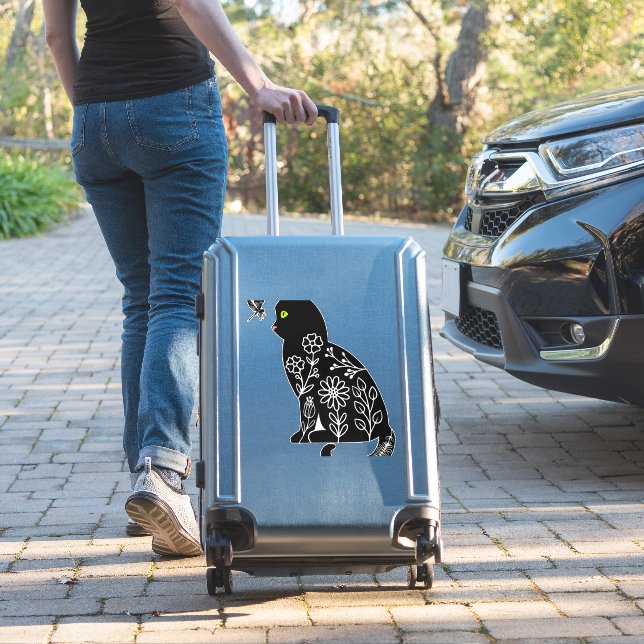 Black cat with green eyes sticker (Suitcase Insitu)