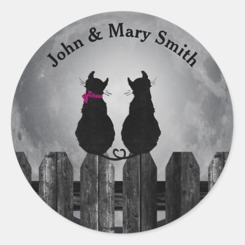 black cats on fence in moonlight classic round sticker