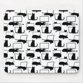 Black Cats Sitting on Laptops Pattern