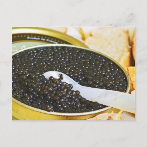 Black caviar and a spoon of mother_of_pearl to postcard
