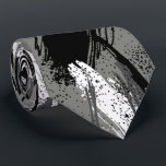 Black Charcoal Gray White Camouflage Neck Tie<br><div class="desc">Men's tie features a modern camouflage pattern in black,  charcoal,  gray and white. MORE designs in store. Cool for the office,  a night on the town,  a wedding,  for the groom or groomsmen or give as a gift to your husband,  dad,  brother or best friend. Make a statement!</div>