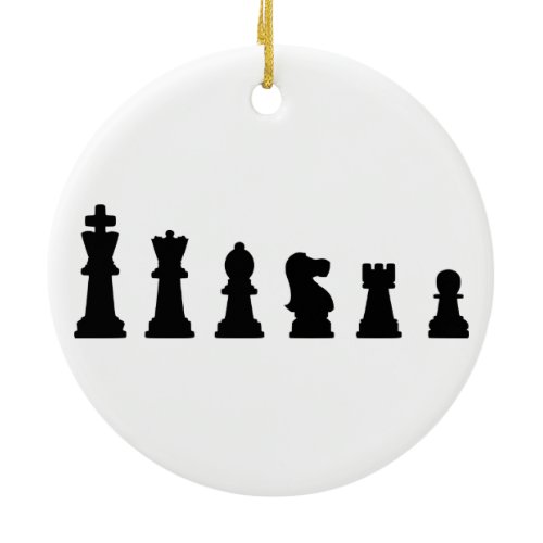 Black chess pieces on white ceramic ornament