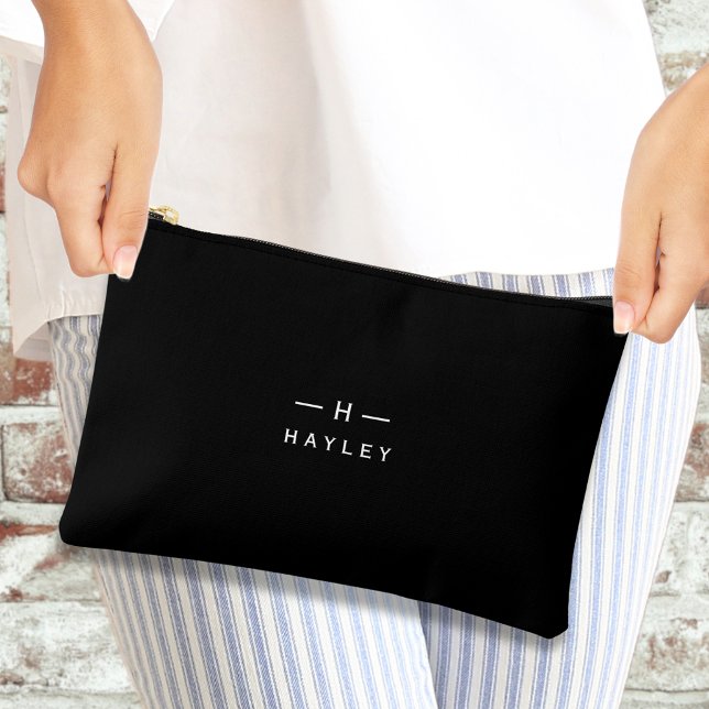 Black chic monogram  accessory pouch (Black and white monogram  accessory pouch being held by a woman's hands)